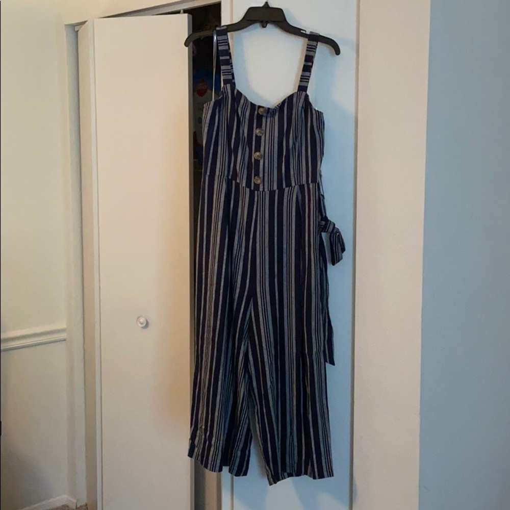 Striped jumpsuit that ties at the waist